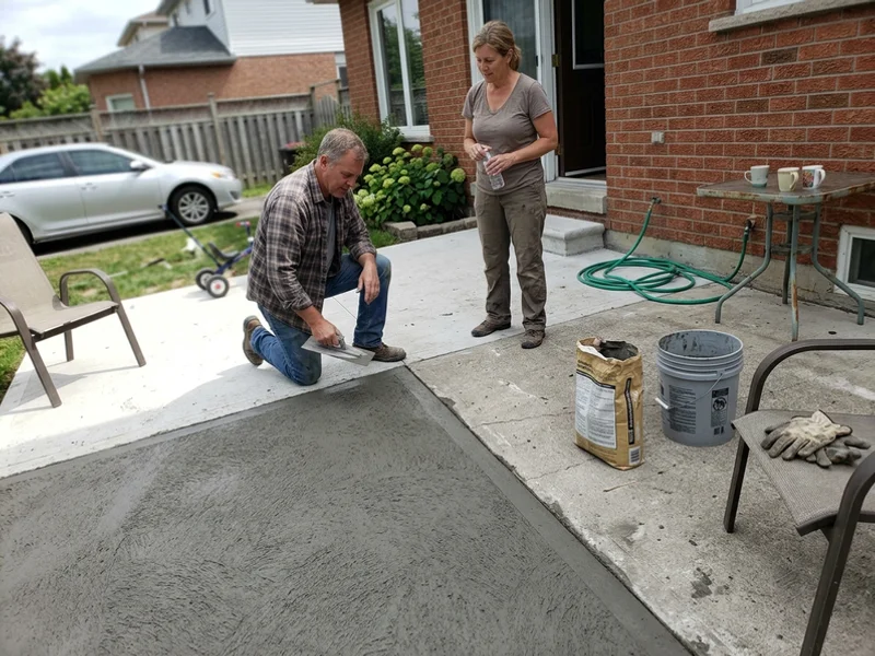 Decorative overlay applied over an existing patio slab